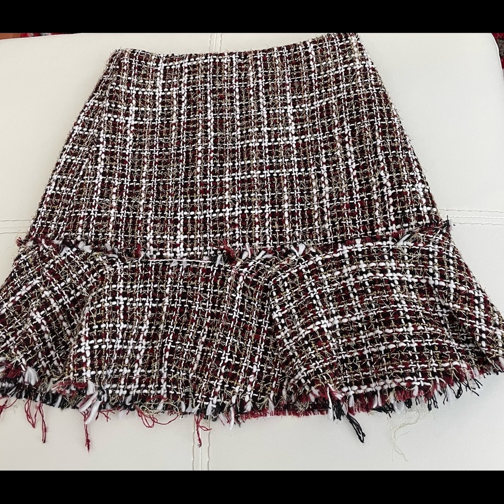 Cute Tweed mini skirt. Multi colored tweed skirt by Francesca’s.